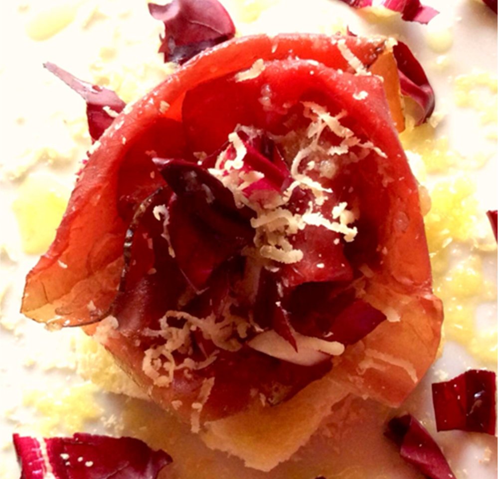 Bresaola rose with Don Carlo cheese and grapefruit vinaigrette